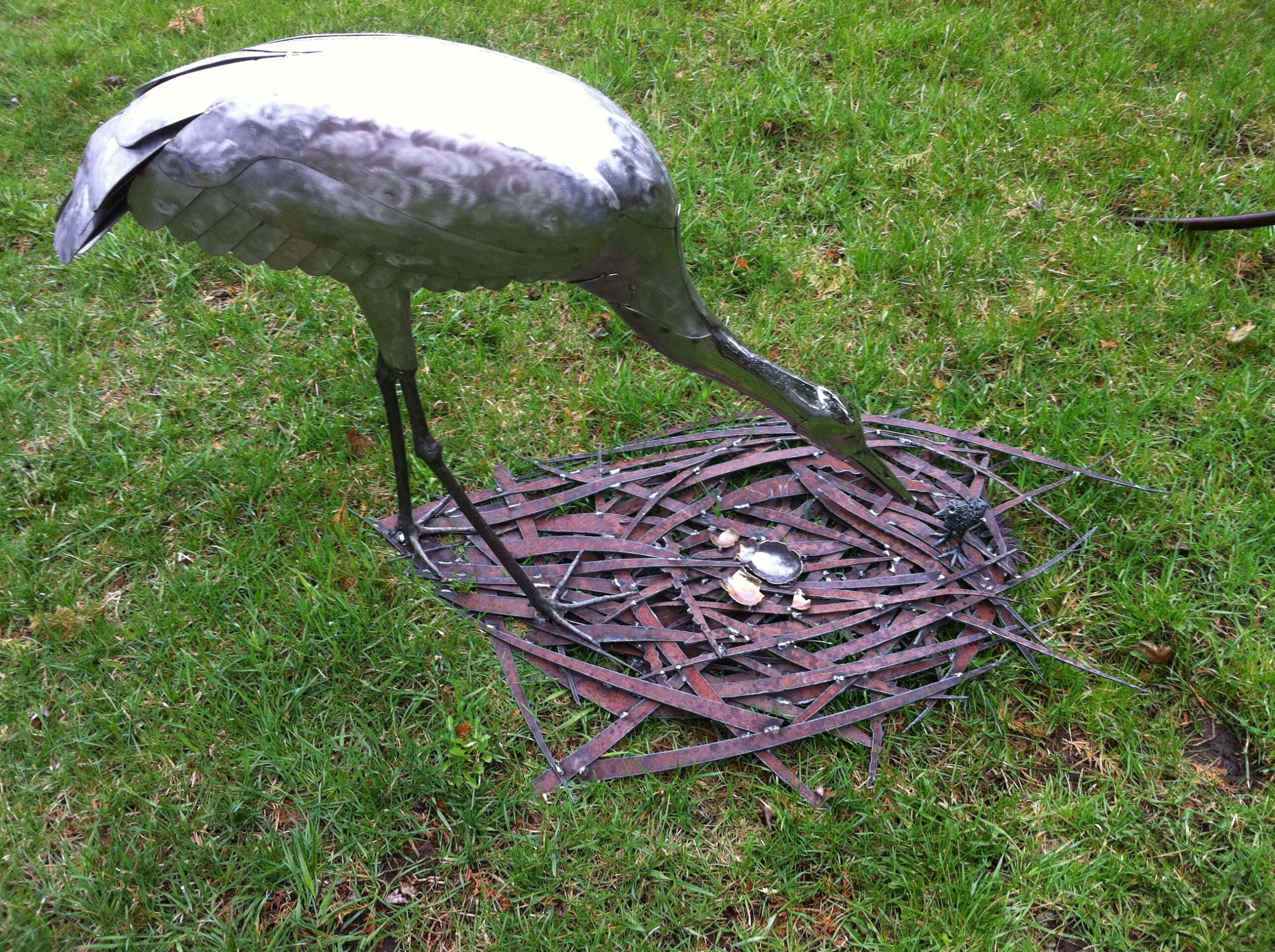 Life-sized metal sculpture